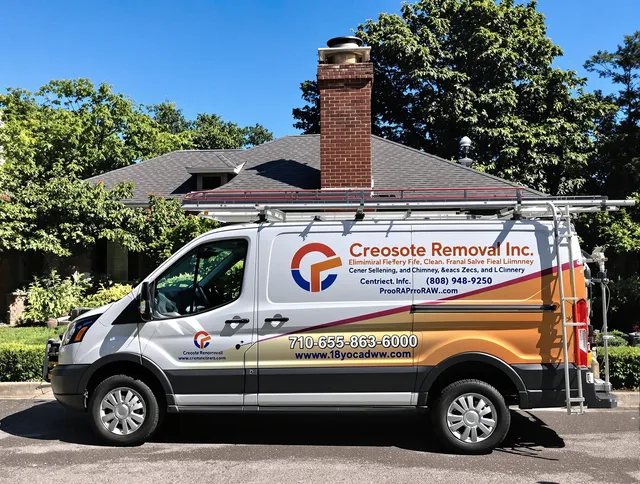 Lewisboro Chimney Sweep technician removing creosote safely in Lewisboro, NY